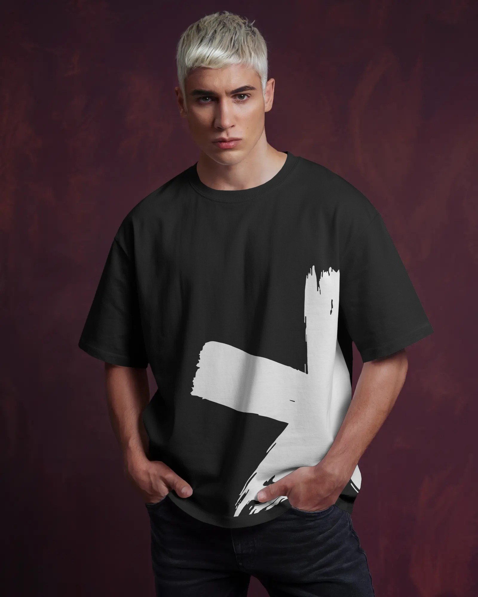 studio-tshirt-mockup-man-in-white-tee-hands-in-pockets-dark-red-textured-background-bold-look-01840